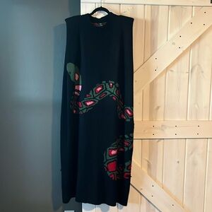 Dressed in LALA Black Dress with Green and Red Snake Design